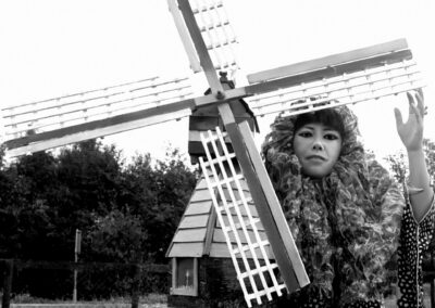 Kusama next to a windmill (1970)